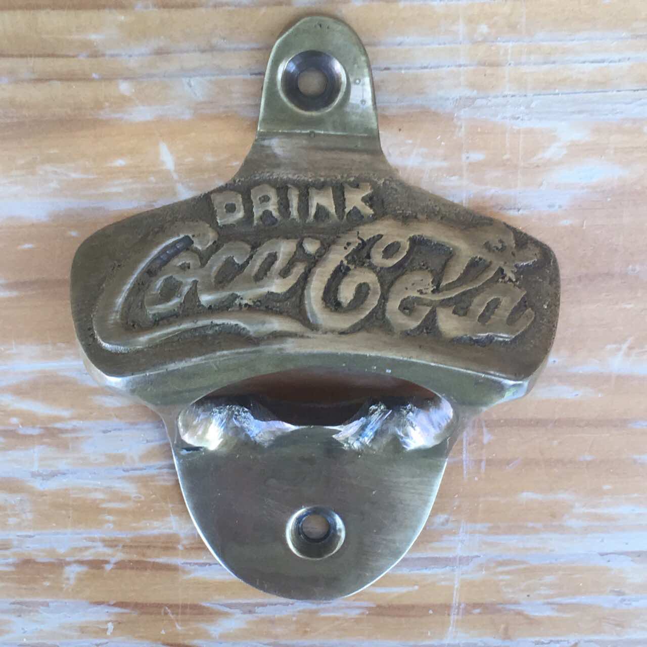 Antique coke bottle opener