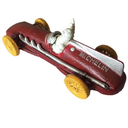 Cast Iron Michelin Man Red Car